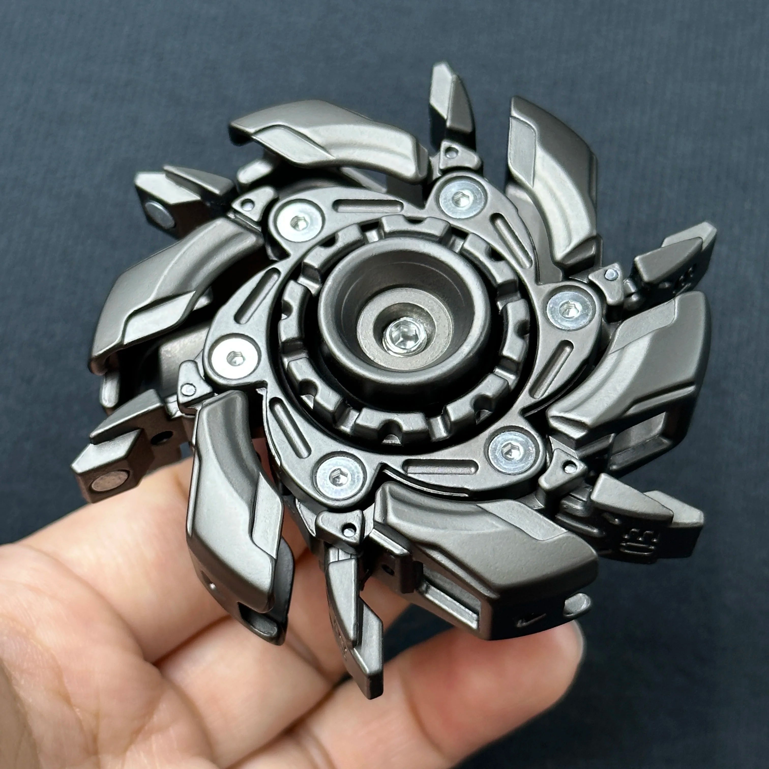 Fidget Slider Armor – Spinner de Metal con Apertura Mecánica