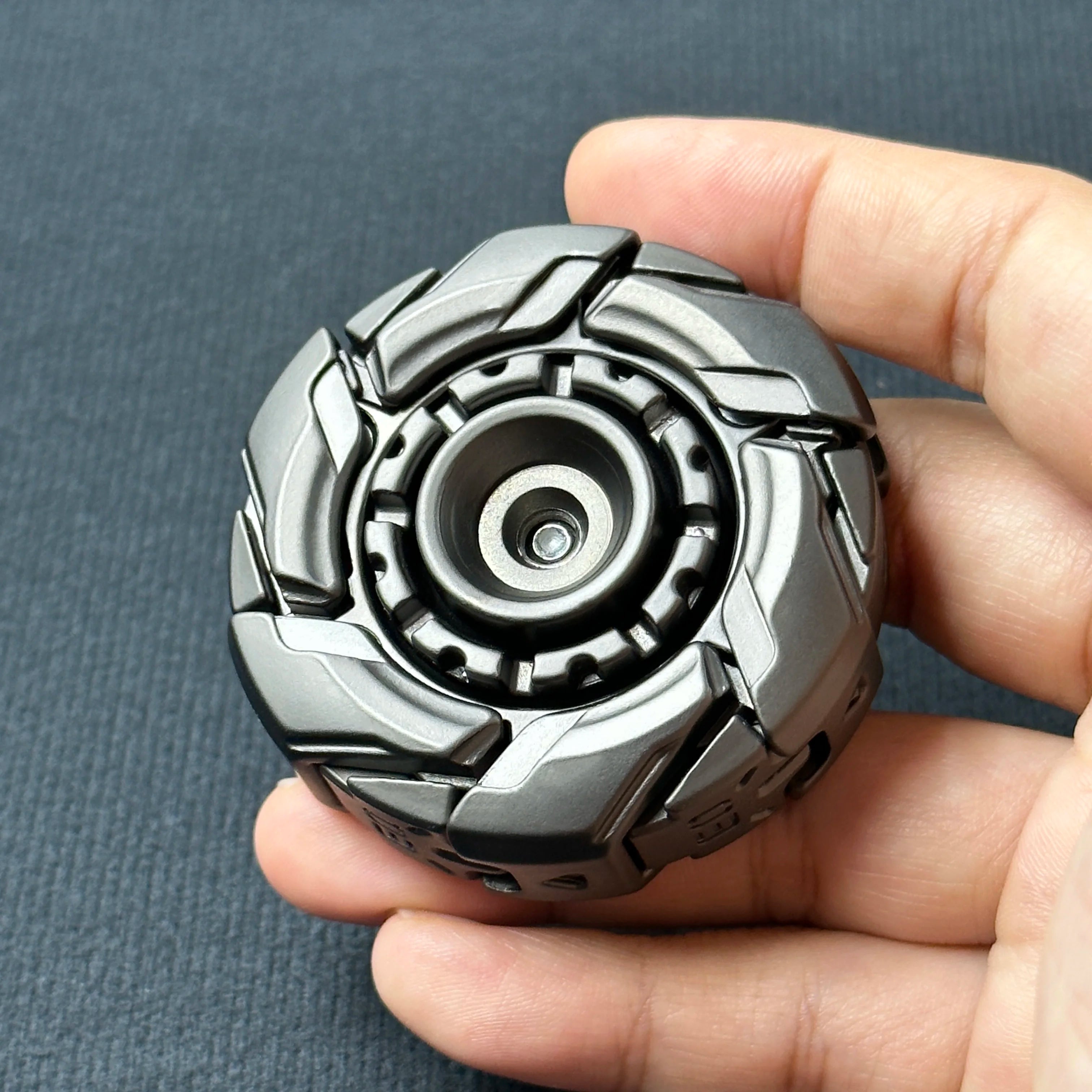 Fidget Slider Armor – Spinner de Metal con Apertura Mecánica