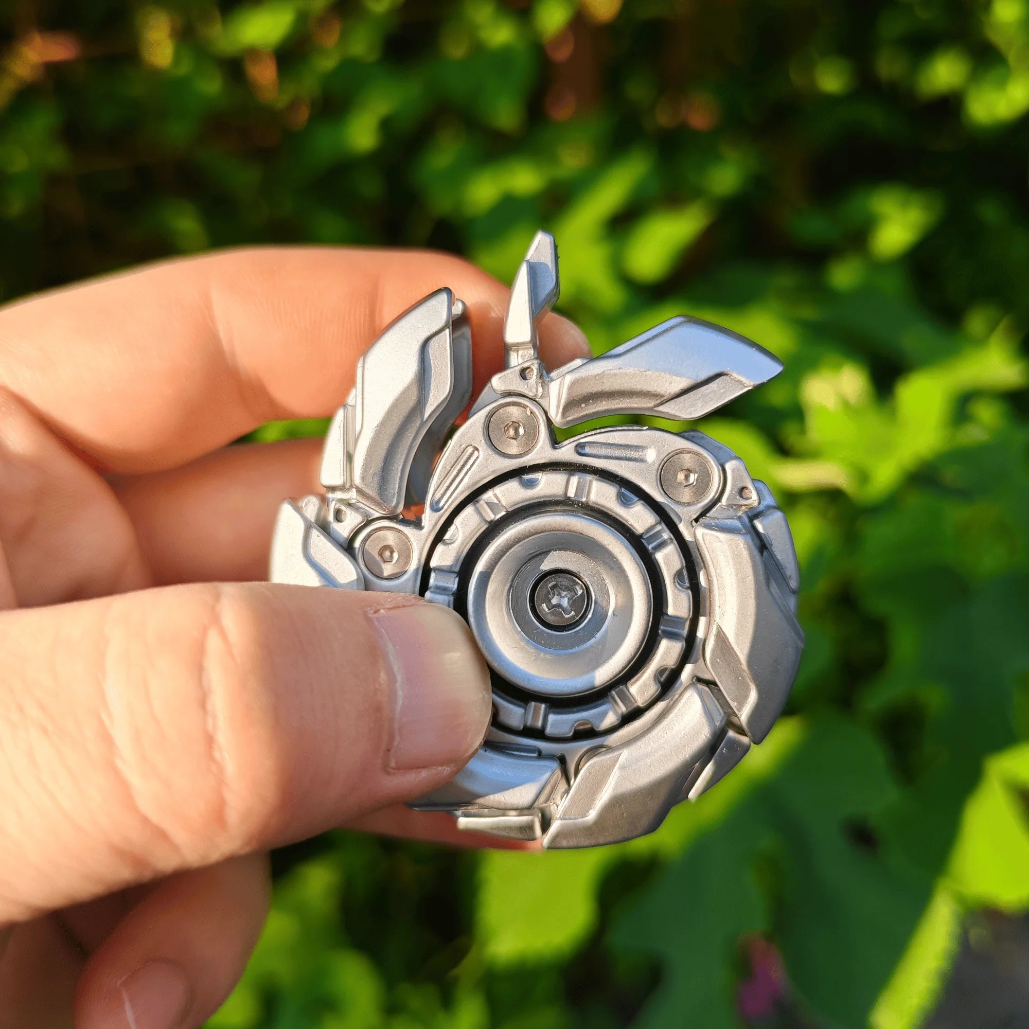 Fidget Slider Armor – Spinner de Metal con Apertura Mecánica