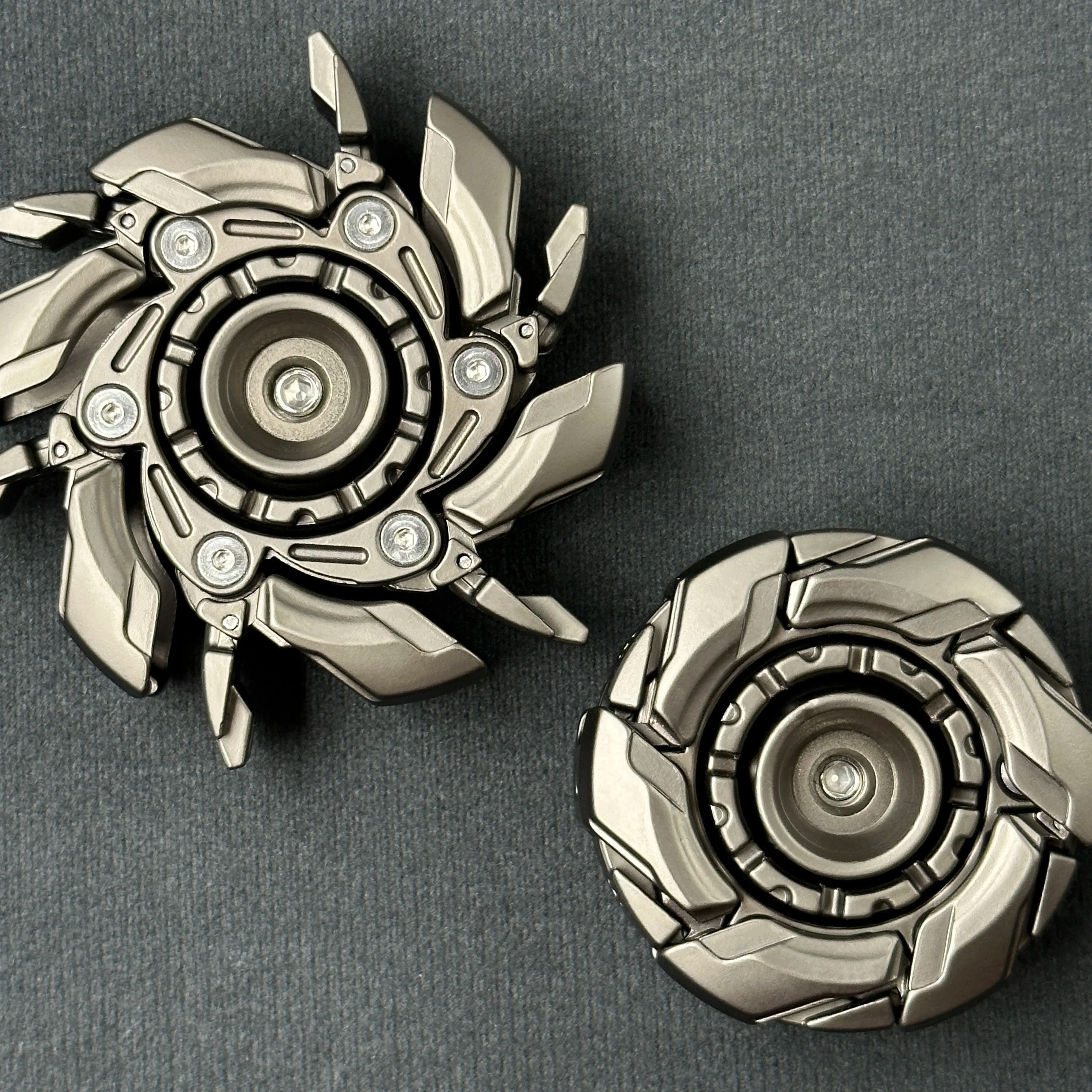 Fidget Slider Armor – Spinner de Metal con Apertura Mecánica